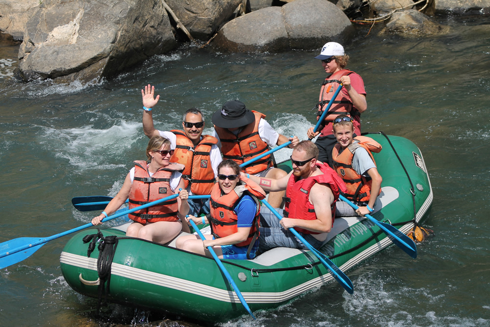 Family enjoying a Durango rafting trip