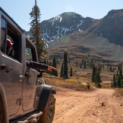 a car parked on the side of a mountain