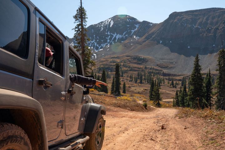 a car parked on the side of a mountain