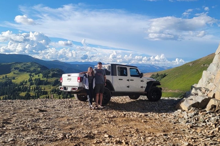 a truck with a mountain in the desert