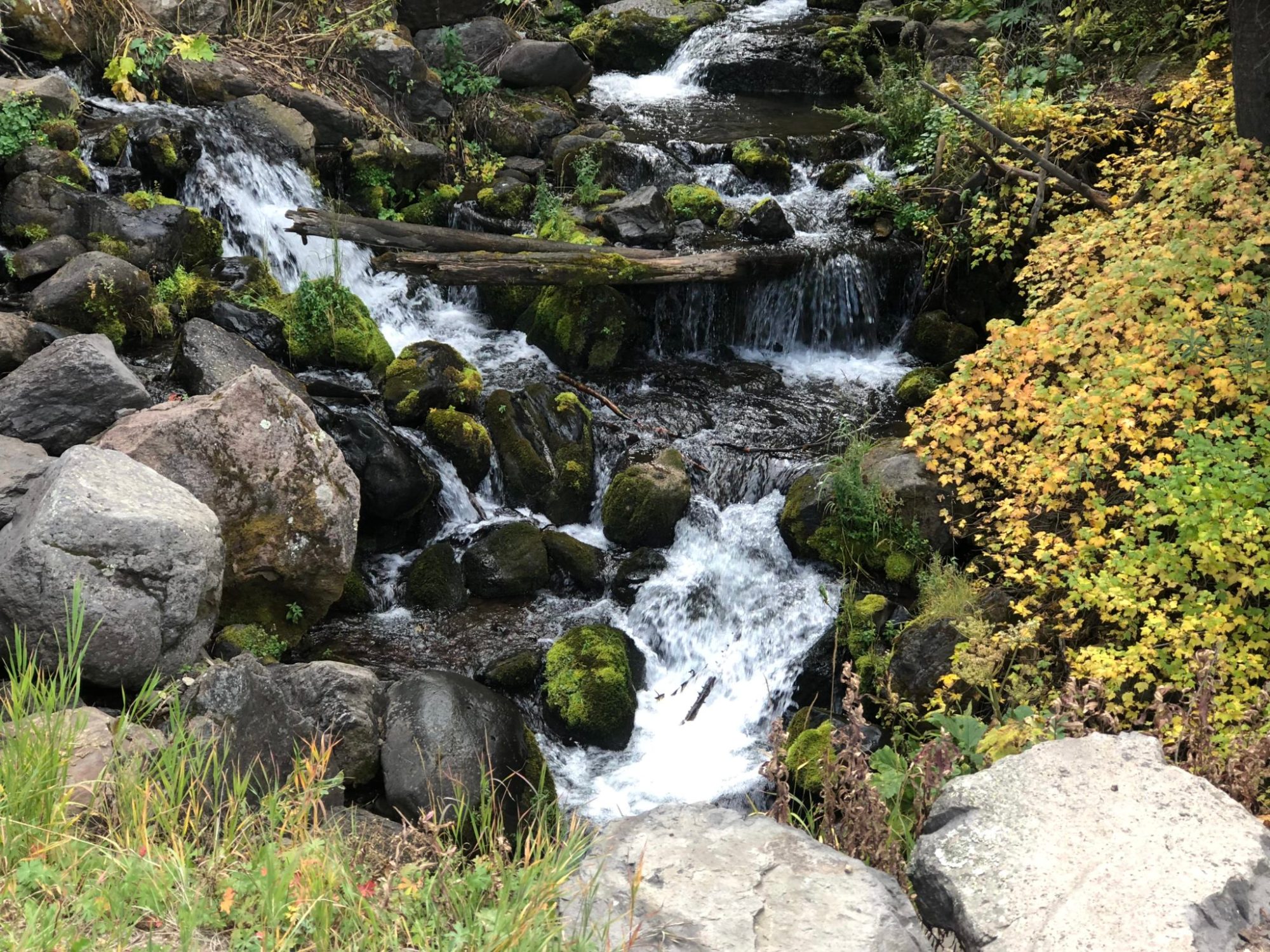 IMG_7101 a large waterfall over a rocky cliff