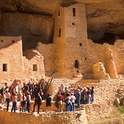 view of people taking a tour of mesa verde