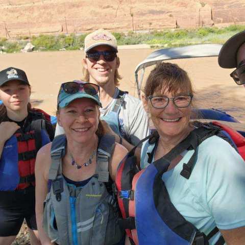 a group of people posing for the camera