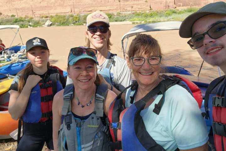 a group of people posing for the camera