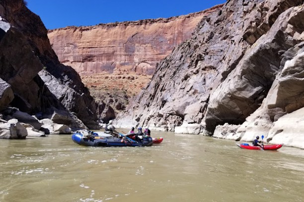 a group of people riding on top of a mountain