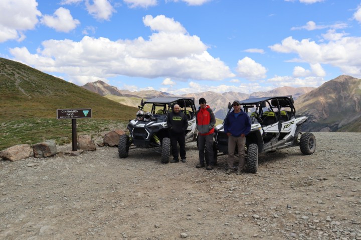 a group of people on a dirt road