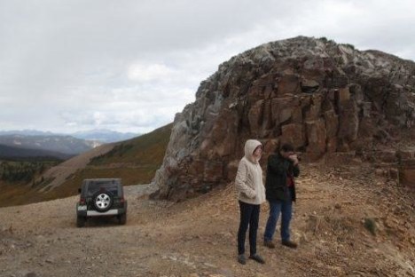 a man standing on a rock